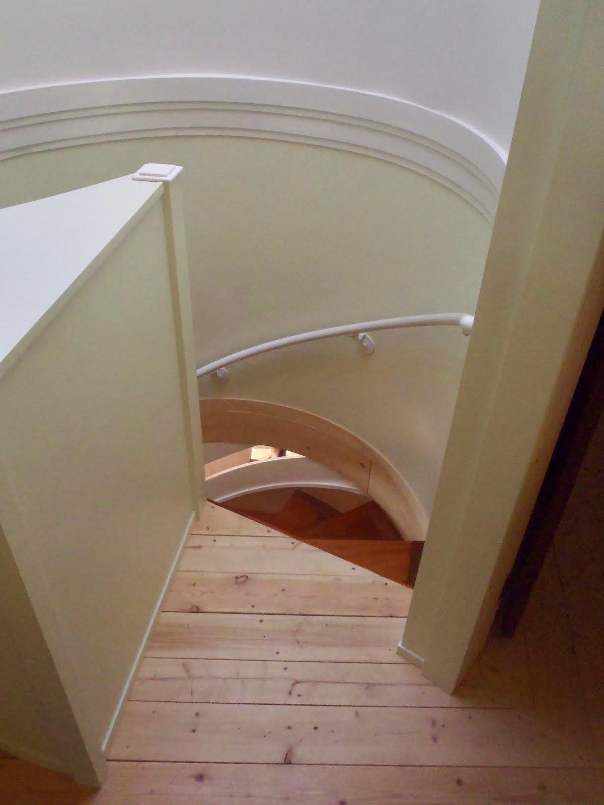 Spiral staircase inside a wooden yurt